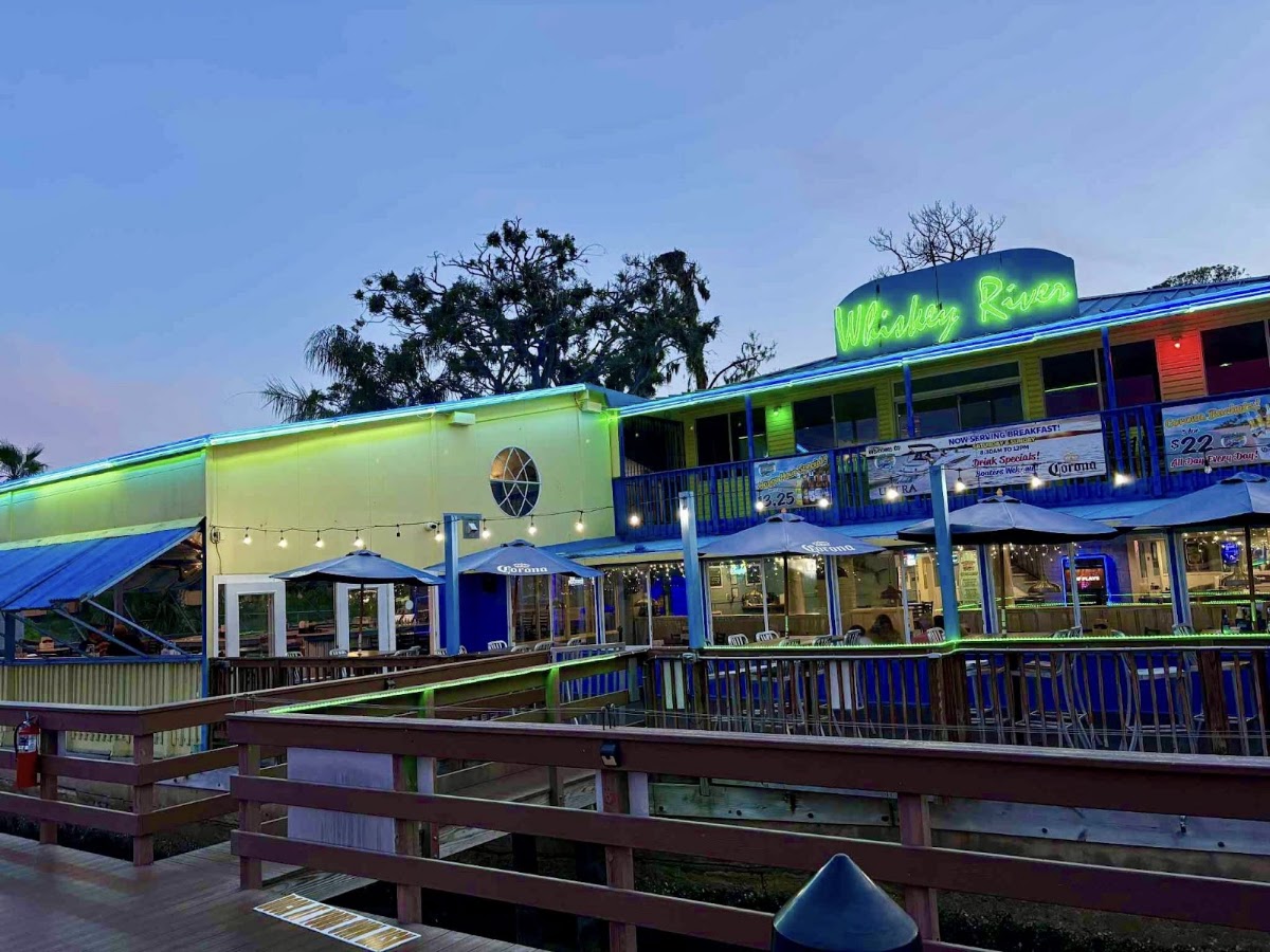 Whiskey River waterfront deck and colourful exterior